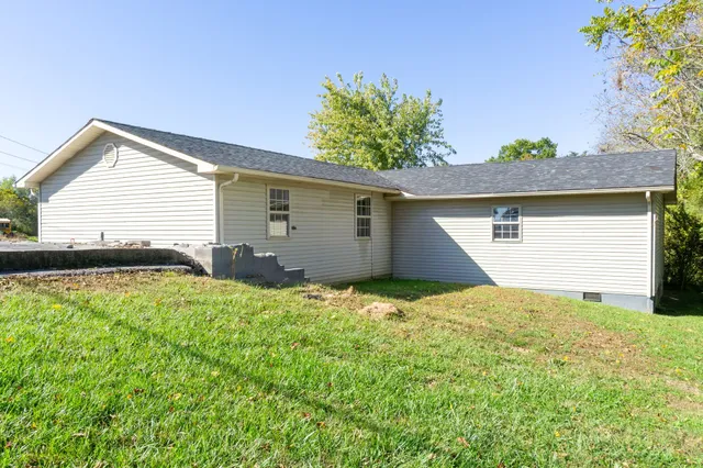 a house view with a garden space