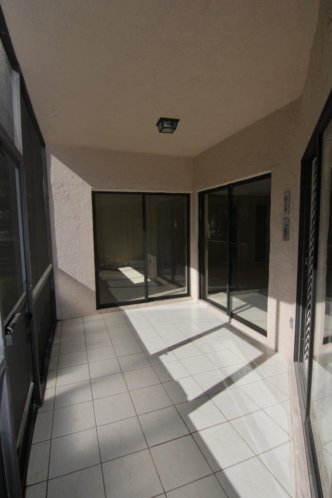 5750 Coach House Circle, Unit D Boca Raton, FL 33486 - Photo 13 of 17 13 Diaz Porch #1