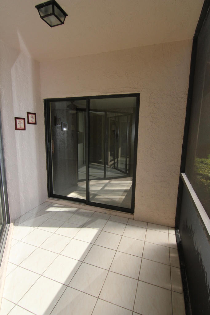 5750 Coach House Circle, Unit D Boca Raton, FL 33486 - Photo 14 of 17 14 Diaz Porch #2