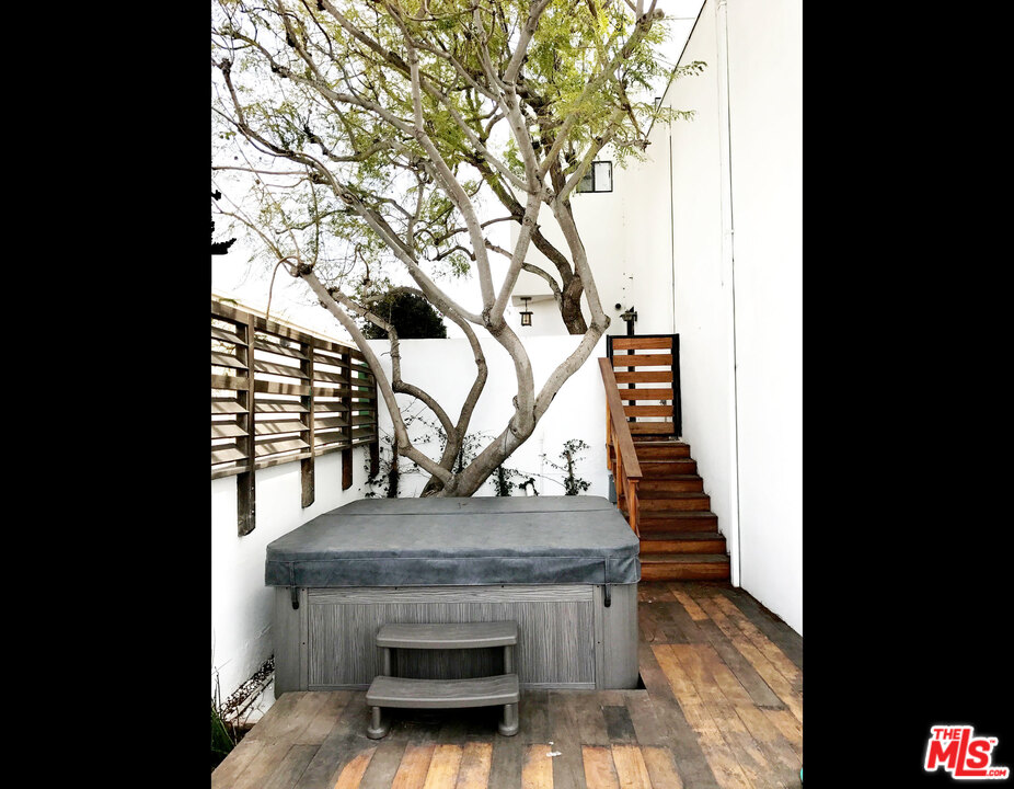 29221 Heathercliff Road, Unit 12 Malibu, CA 90265 - Photo 3 of 8 a view of entryway wooden floor and front door