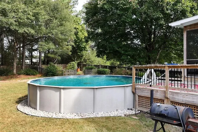 a view of a chairs and table in the patio