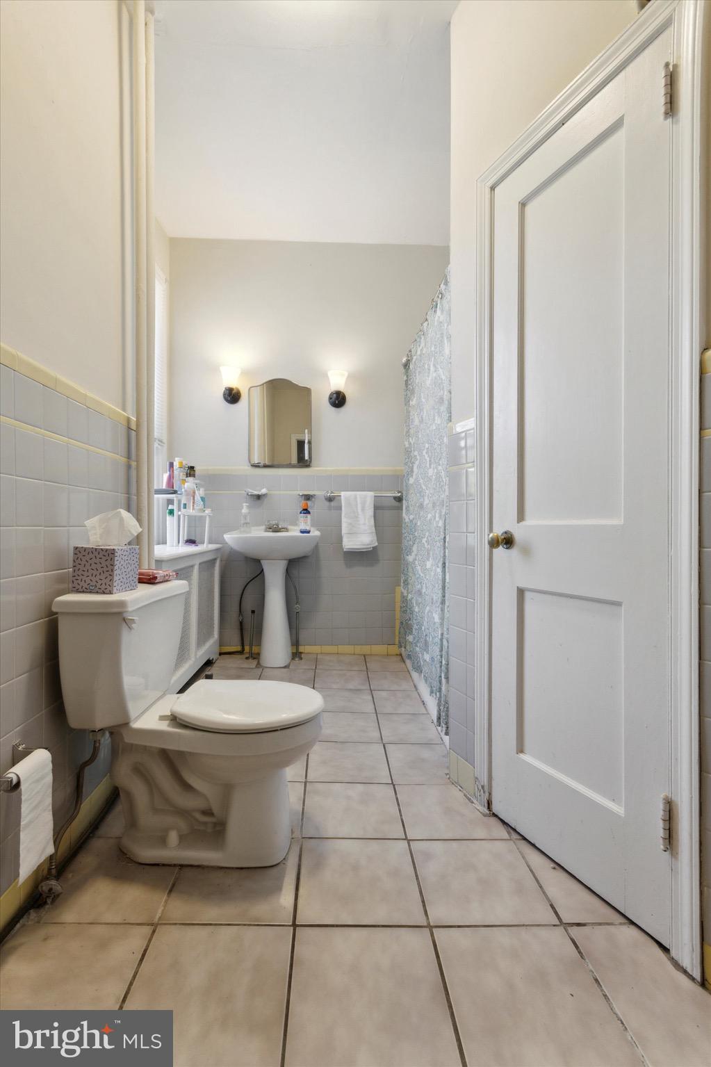 118 Walnut Avenue, Unit 2 Ardmore, PA 19003 - Photo 15 of 15 a bathroom with a sink toilet and shower