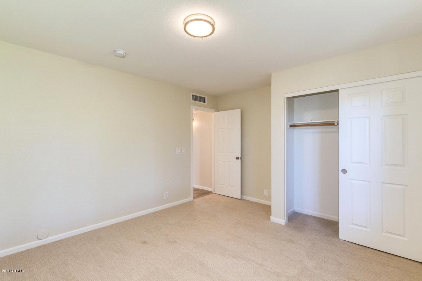 8757 West Wethersfield Road Peoria, AZ 85381 - Photo 12 of 18 12. l.Secondary bedroom