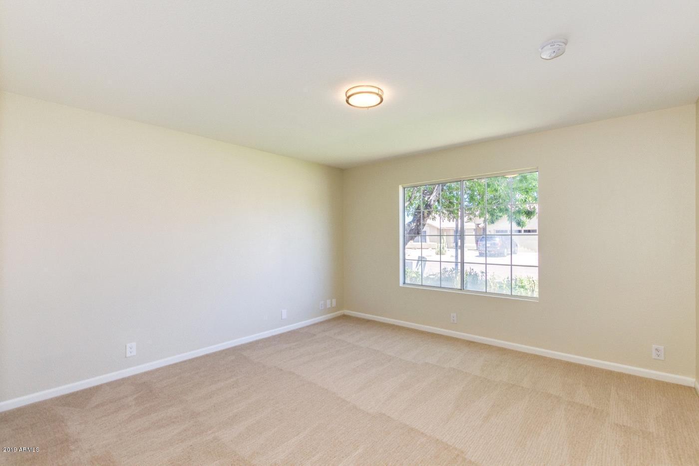 8757 West Wethersfield Road Peoria, AZ 85381 - Photo 14 of 18 14. n.Secondary bedroom