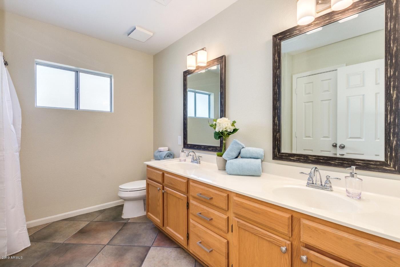 8757 West Wethersfield Road Peoria, AZ 85381 - Photo 15 of 18 15. o.Hall bathroom