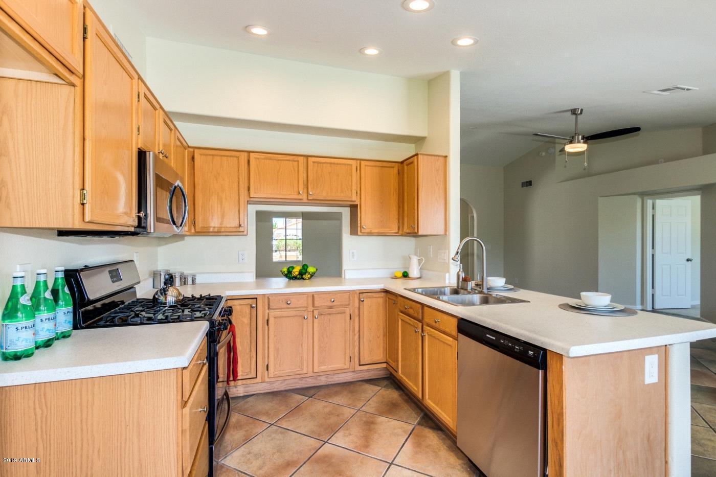 8757 West Wethersfield Road Peoria, AZ 85381 - Photo 7 of 18 7. g.Kitchen 2