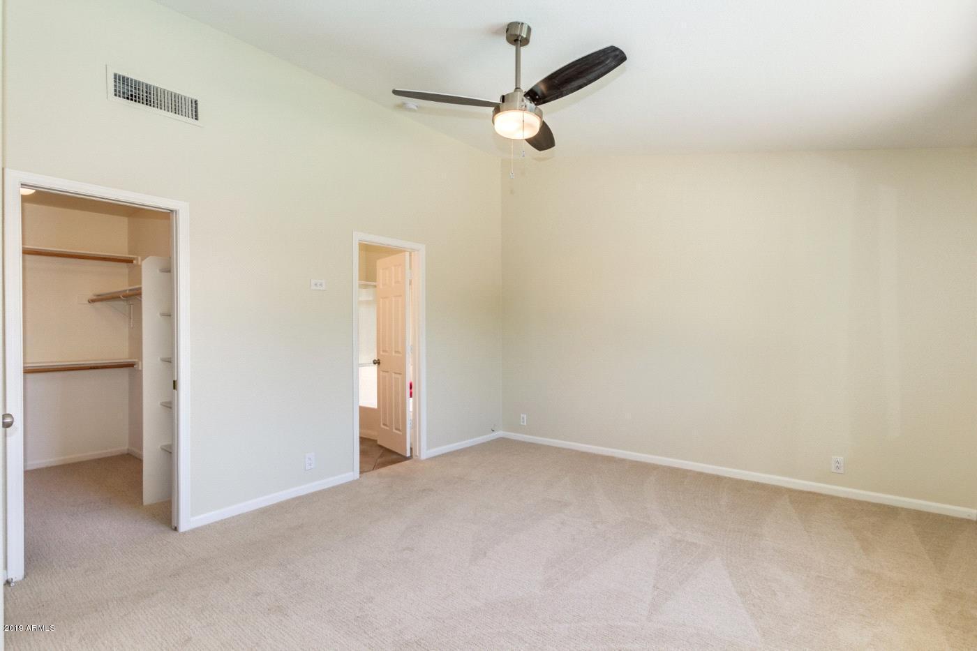 8757 West Wethersfield Road Peoria, AZ 85381 - Photo 9 of 18 9. i.Master bedroom