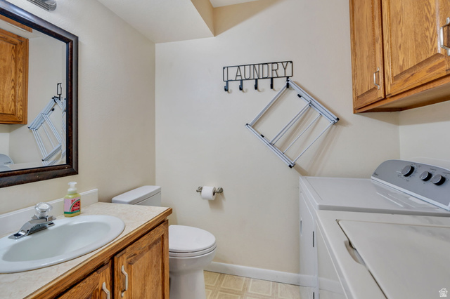 1402 South 1470th Street East Provo, UT 84606 - Photo 14 of 21 Half bath/laundry room on main floor