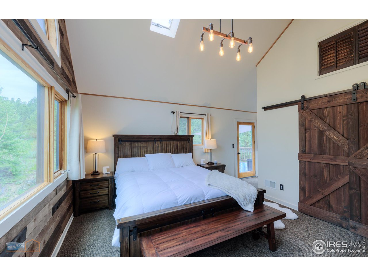 111 Puma Drive Boulder, CO 80302 - Photo 4 of 37 a bedroom with a bed window and dresser