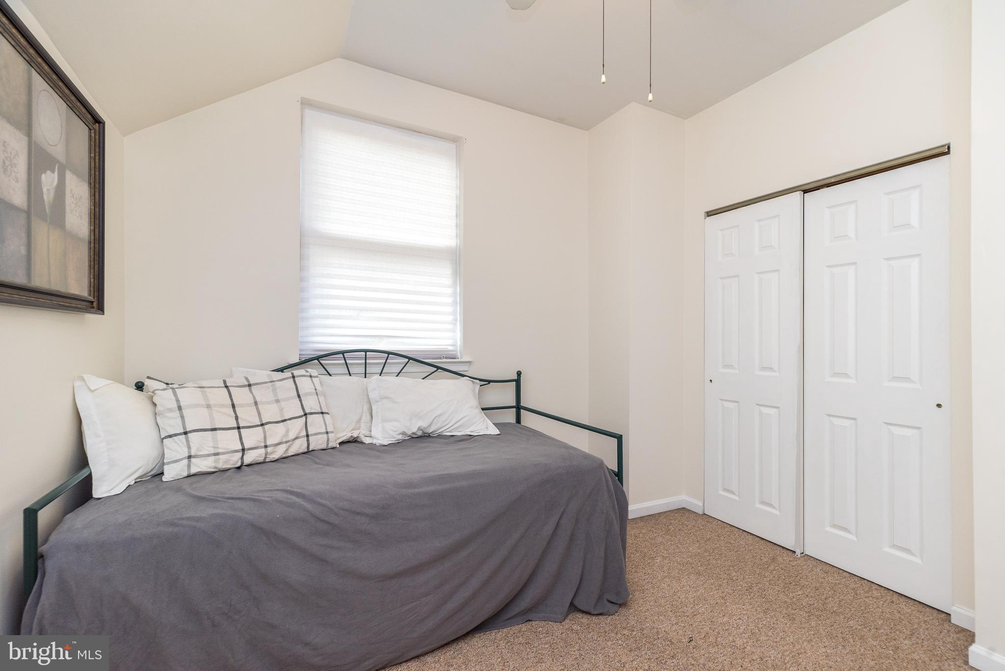205 South 7th Street Perkasie, PA 18944 - Photo 11 of 24 a bedroom with a bed and a window