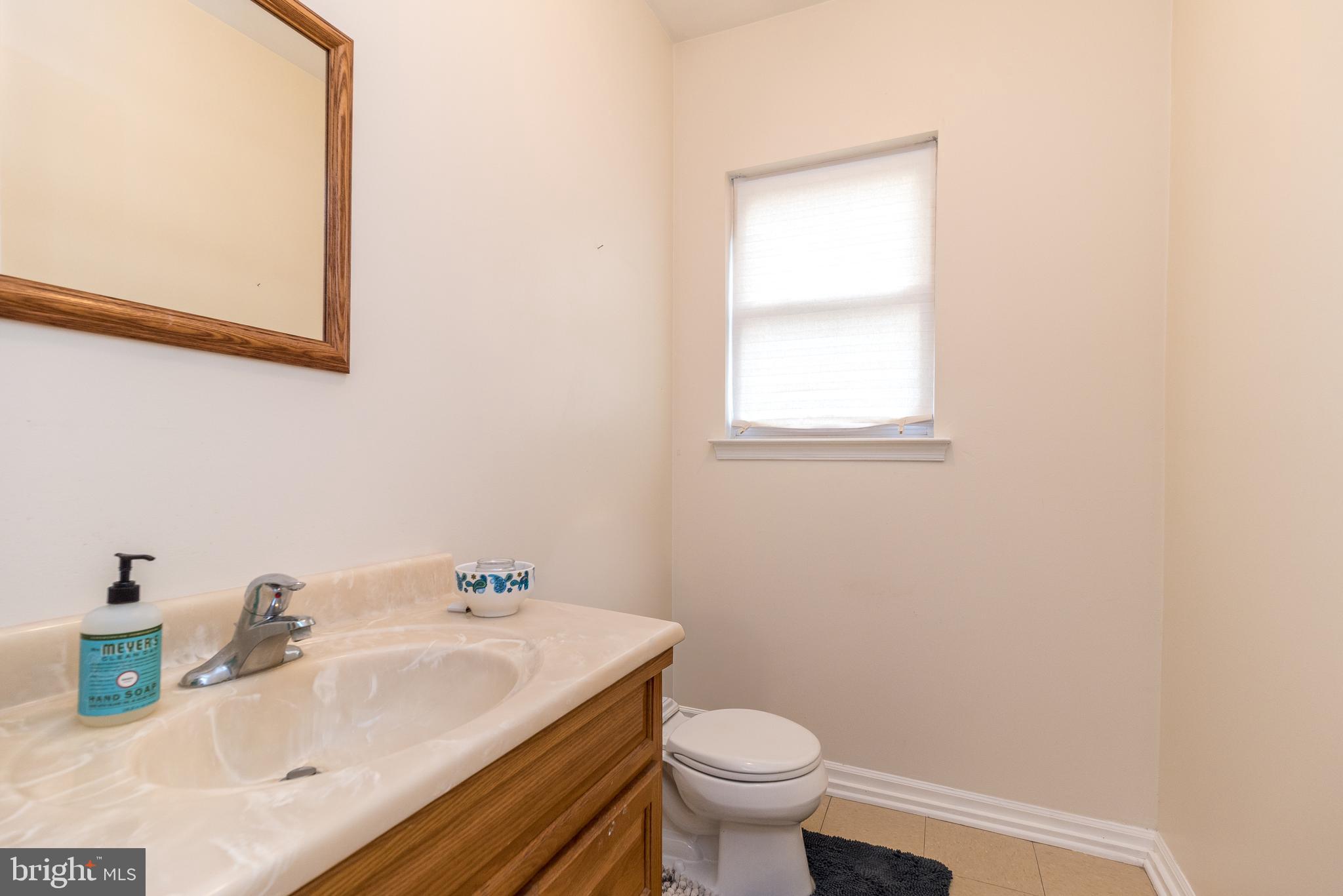 205 South 7th Street Perkasie, PA 18944 - Photo 19 of 24 a bathroom with a sink and a toilet