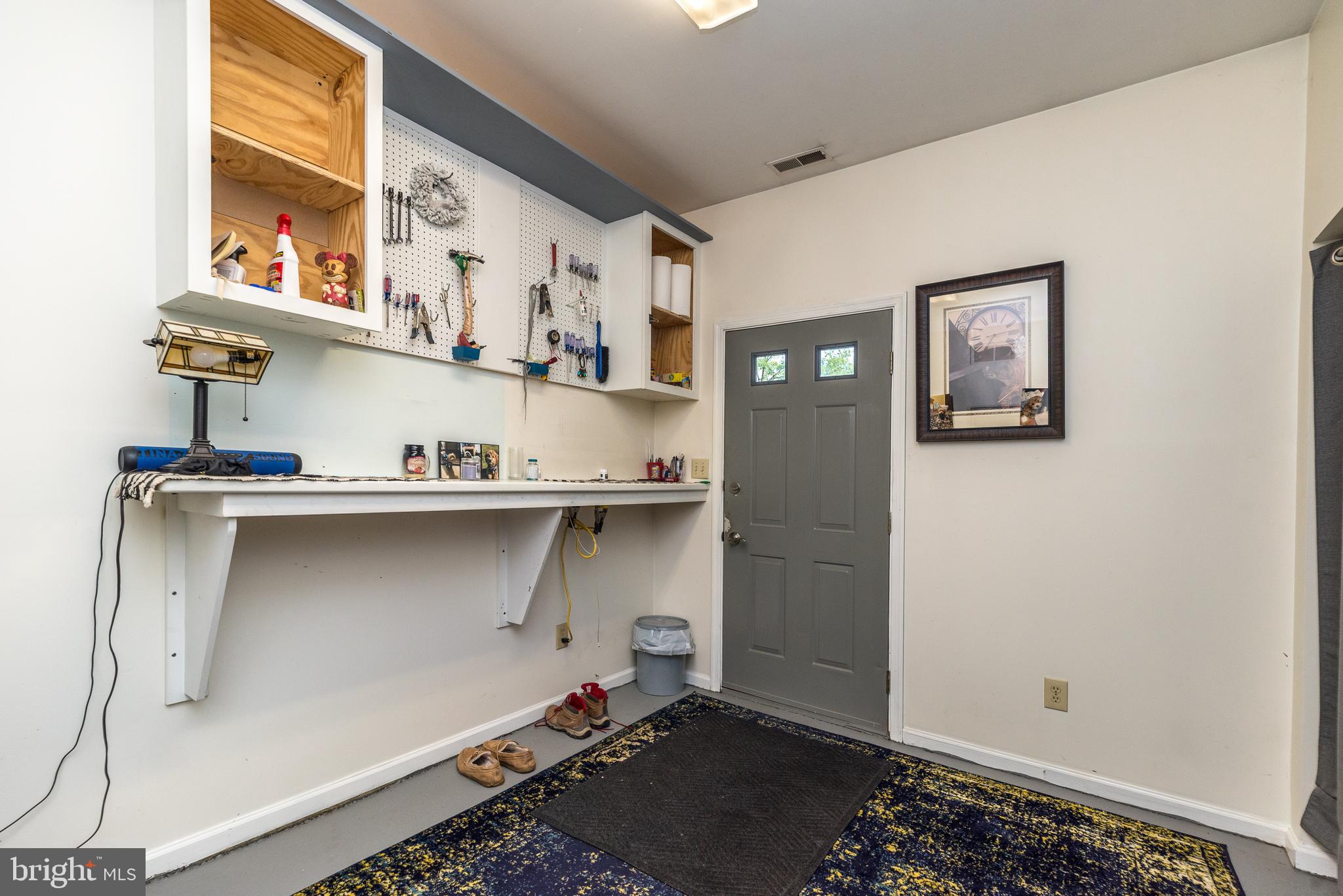 205 South 7th Street Perkasie, PA 18944 - Photo 20 of 24 a room with a wooden floor and cabinets
