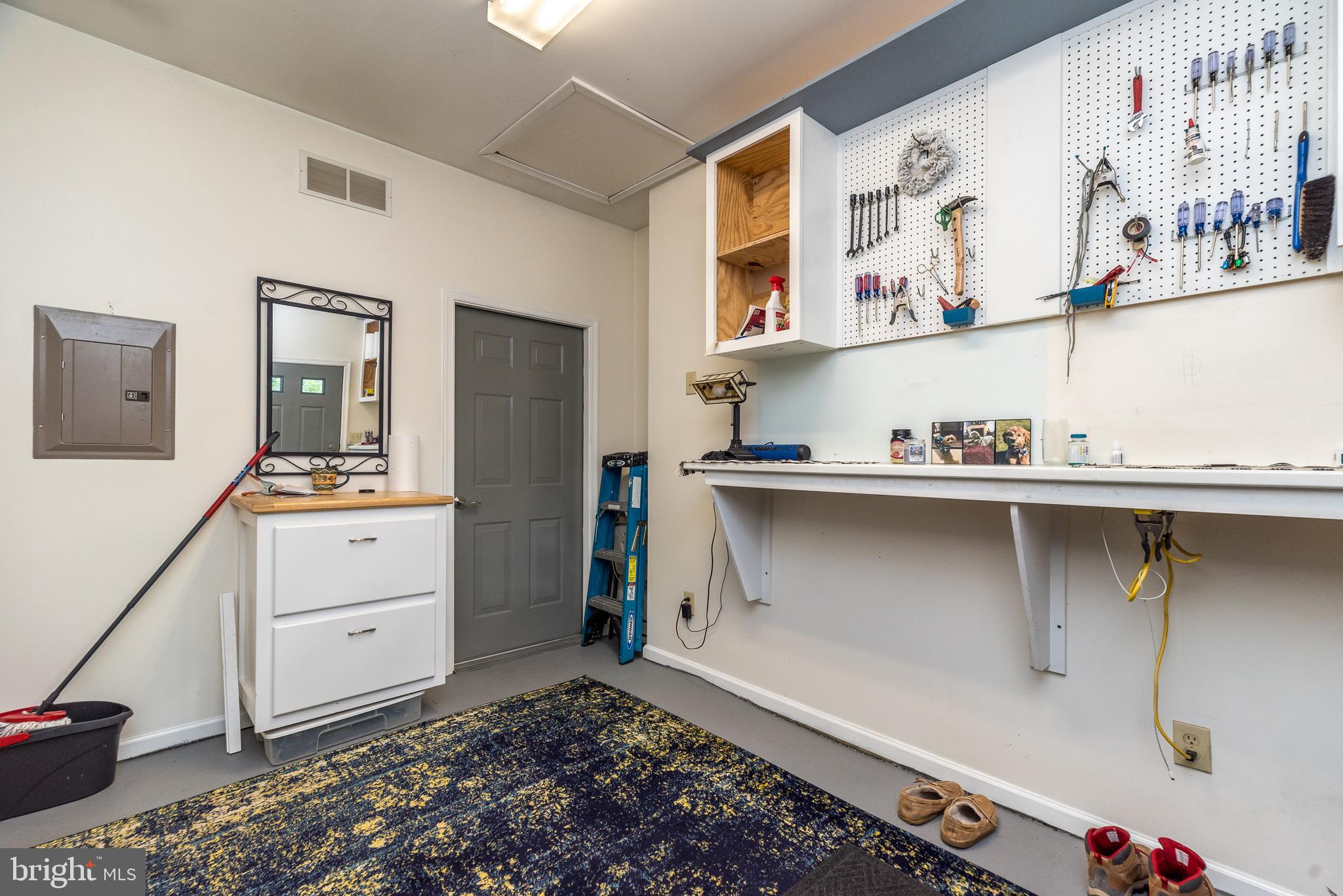 205 South 7th Street Perkasie, PA 18944 - Photo 21 of 24 a room with a walk in closet and a mirror