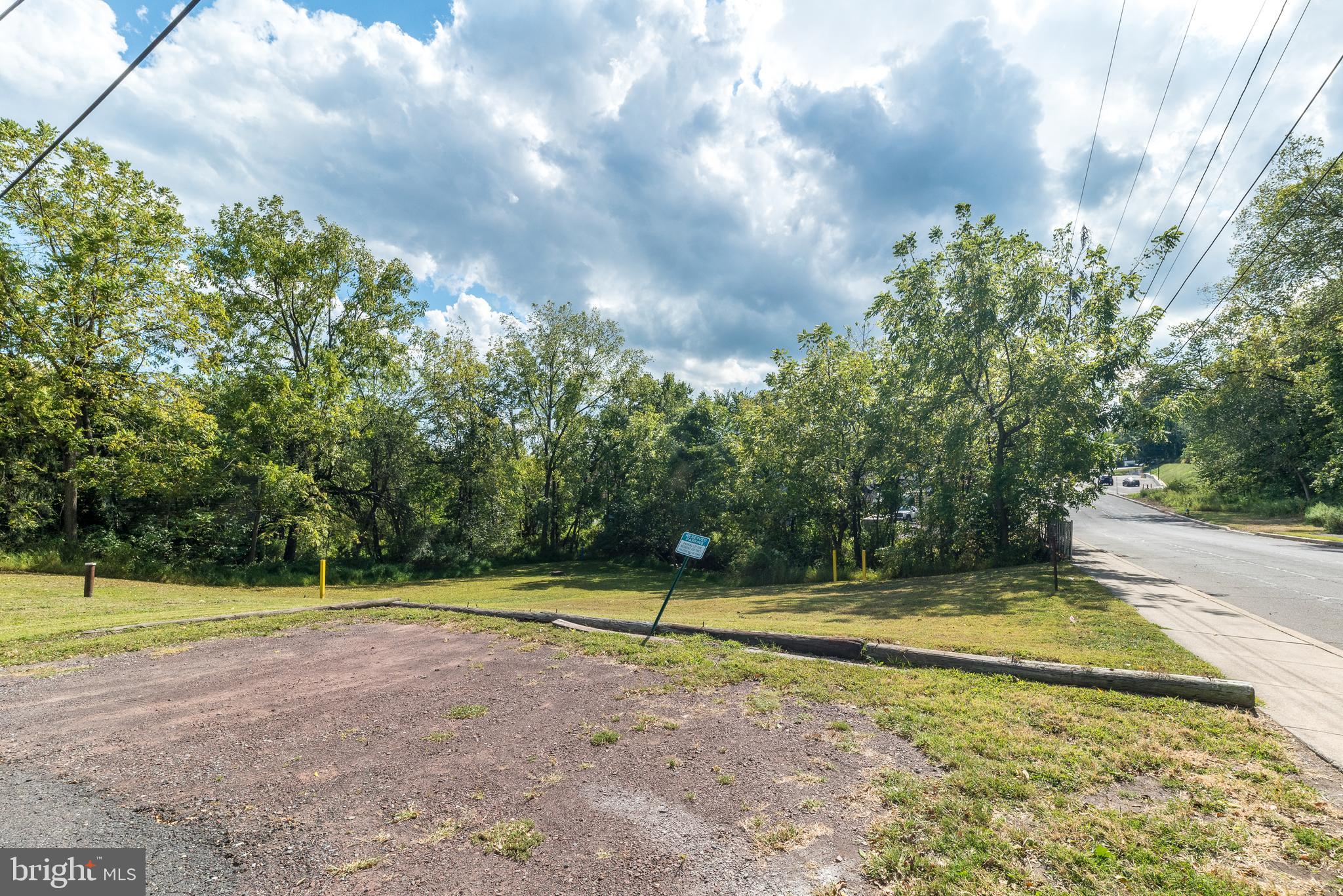 205 South 7th Street Perkasie, PA 18944 - Photo 24 of 24 a view of a tennis ground with large trees