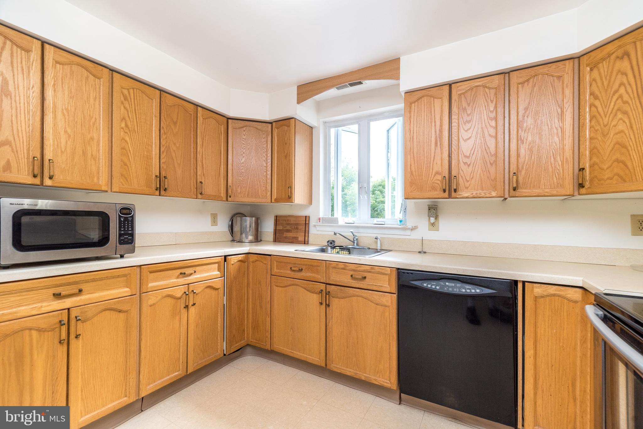 205 South 7th Street Perkasie, PA 18944 - Photo 3 of 24 a kitchen with a sink cabinets and window