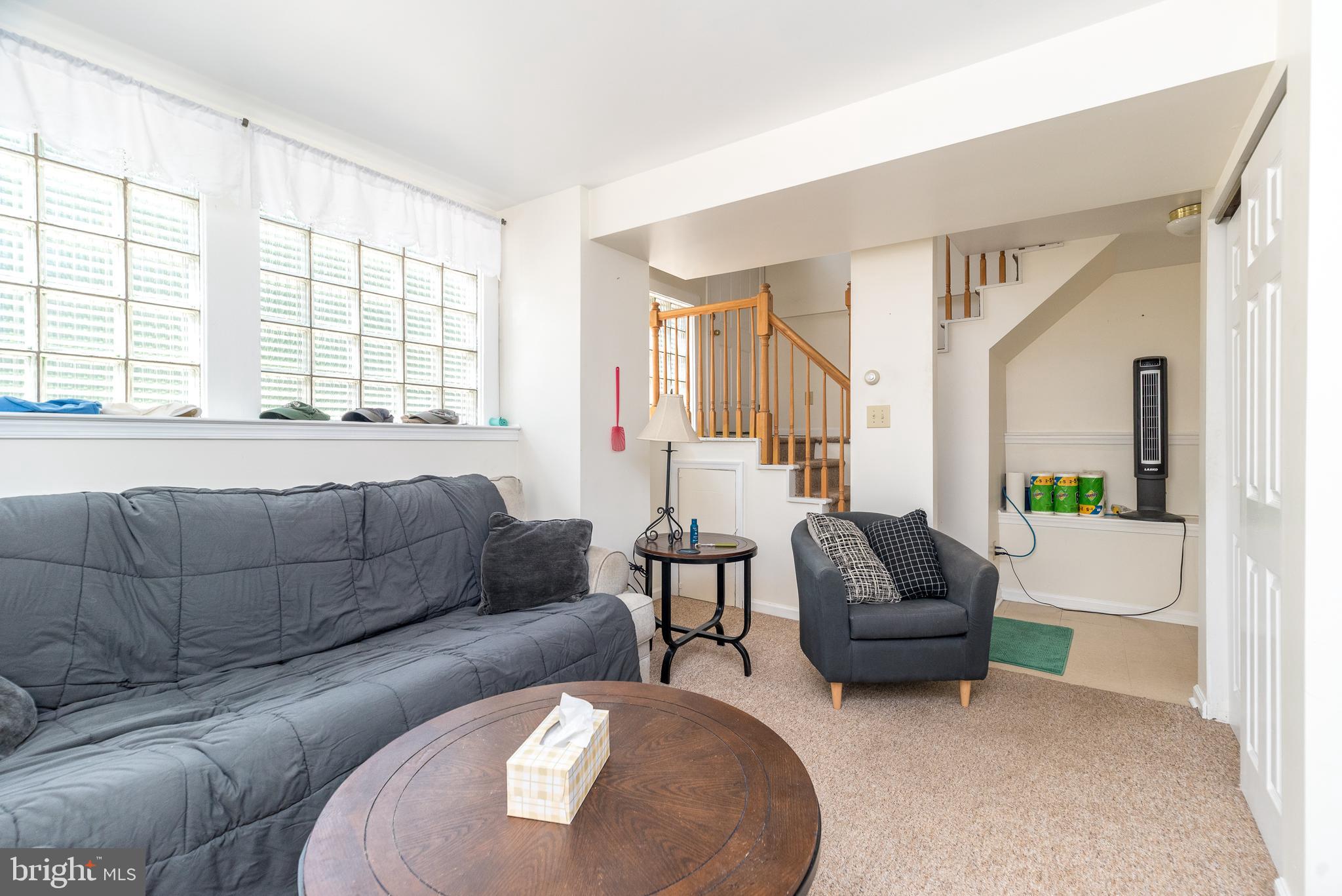 205 South 7th Street Perkasie, PA 18944 - Photo 7 of 24 a living room with furniture and a large window