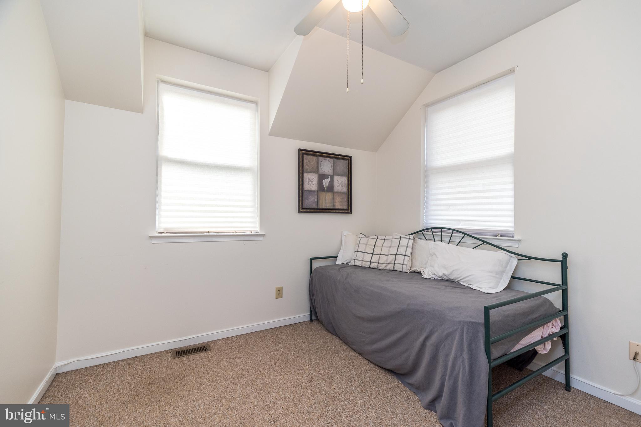 205 South 7th Street Perkasie, PA 18944 - Photo 10 of 24 a bedroom with a bed and a window