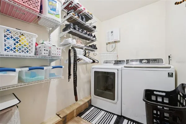 a utility room with dryer and washer