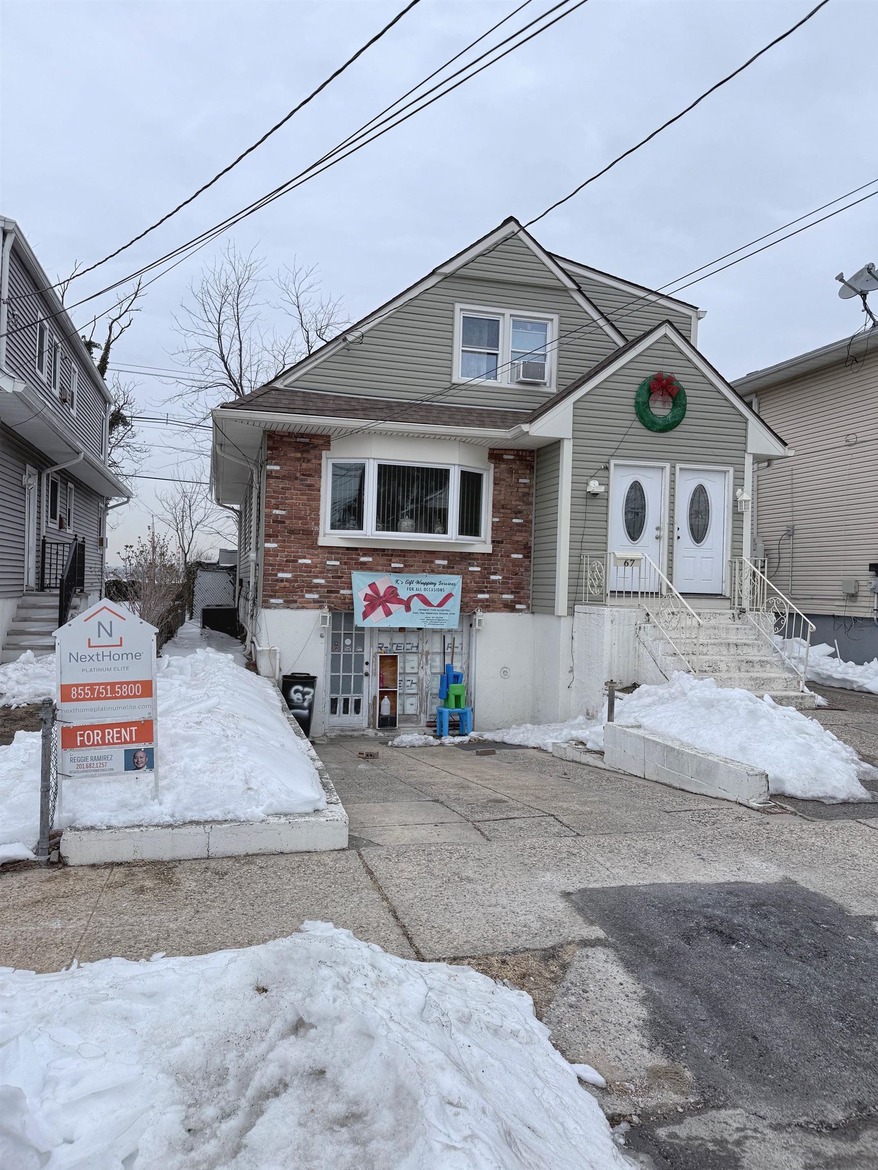 a front view of a house with garage