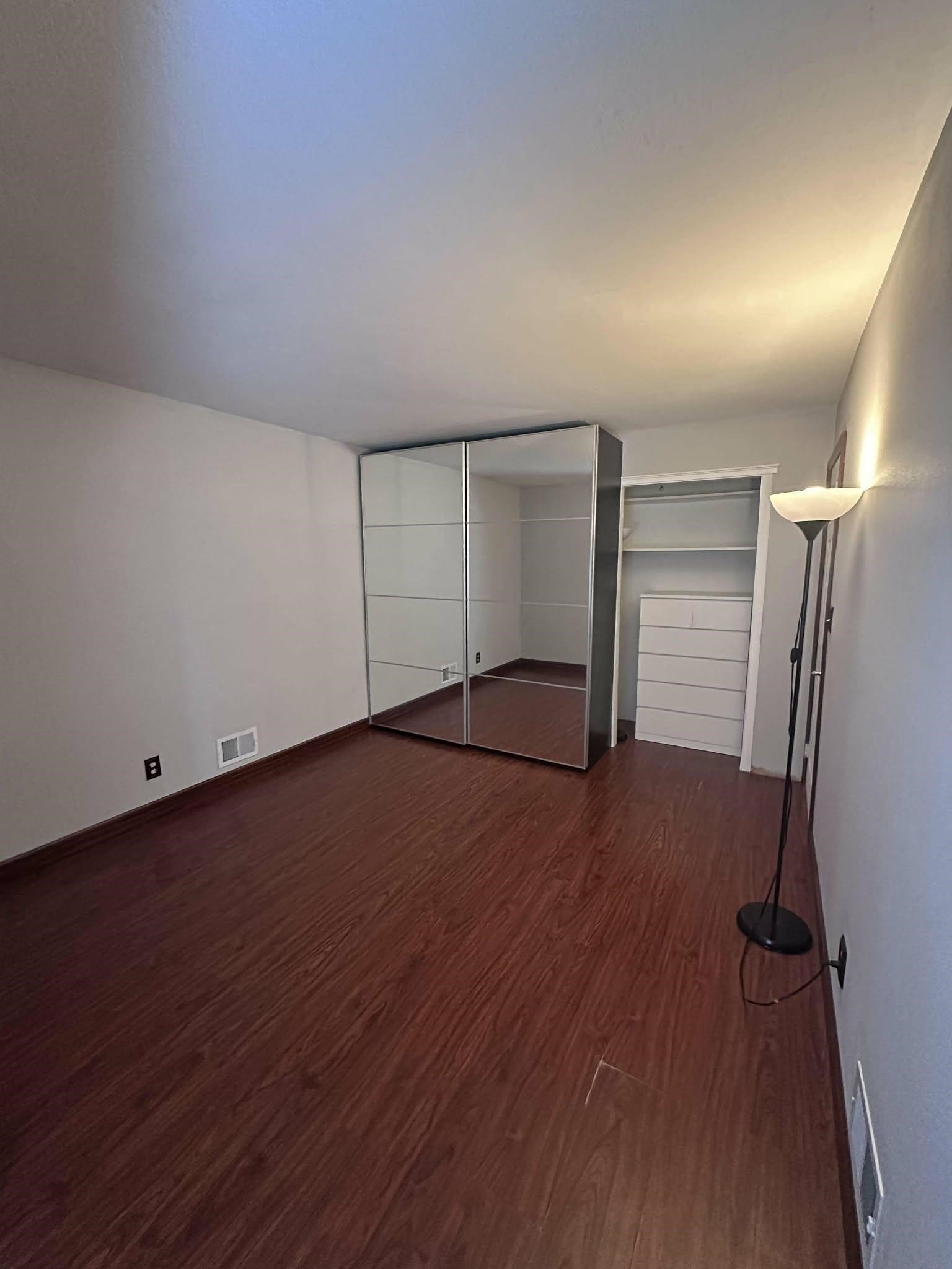 67 Country Village Road, Unit 2 Jersey City, NJ 07305 - Photo 16 of 20 a view of empty room with wooden floor