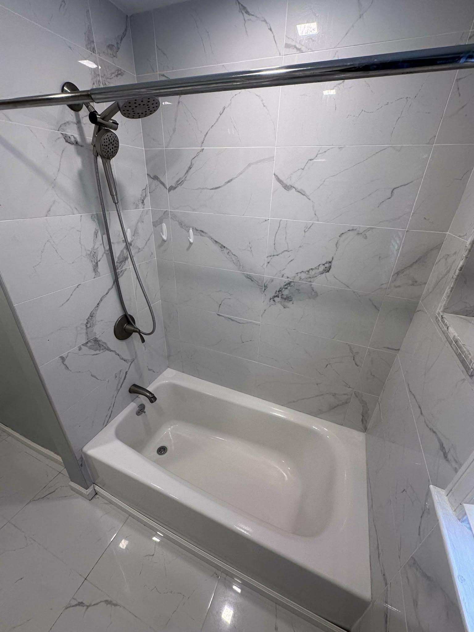 67 Country Village Road, Unit 2 Jersey City, NJ 07305 - Photo 7 of 20 a bathroom with a bathtub