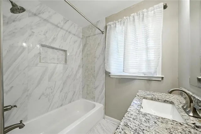 a close up of a bathtub in a bathroom