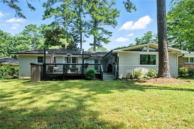 a house view with a garden space