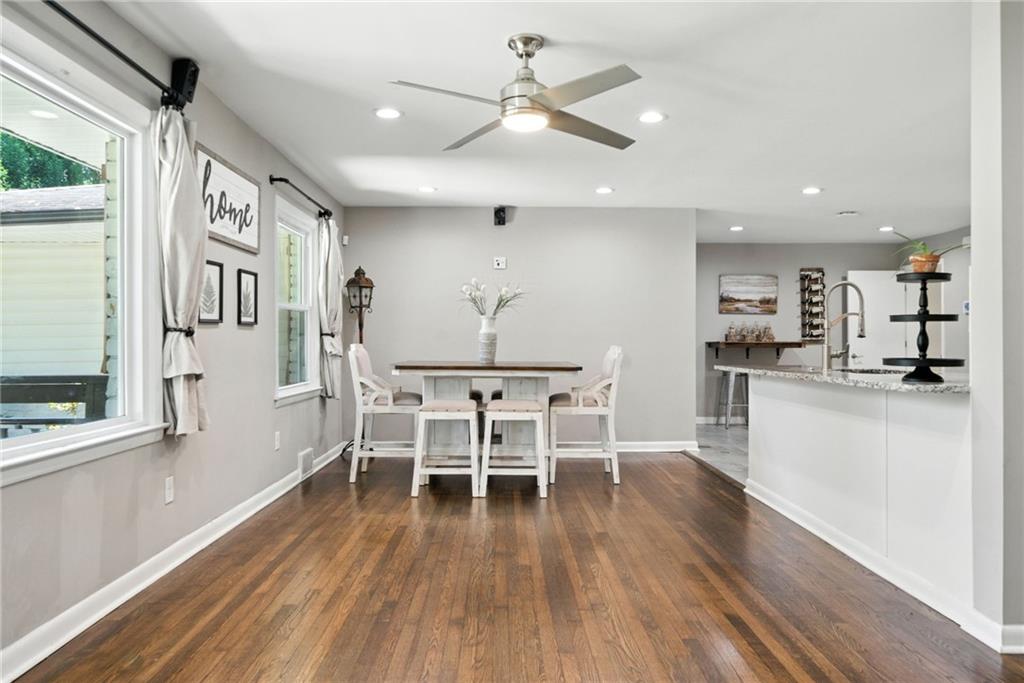 3331 Casa Linda Drive Decatur, GA 30032 - Photo 7 of 42 a dining room with furniture and wooden floor