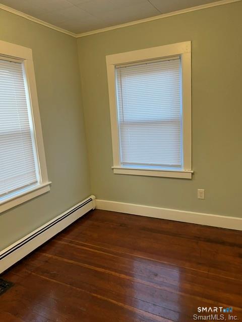 6 Boys Avenue Killingly, CT 06263 - Photo 17 of 20 a view of an empty room with wooden floor and a window
