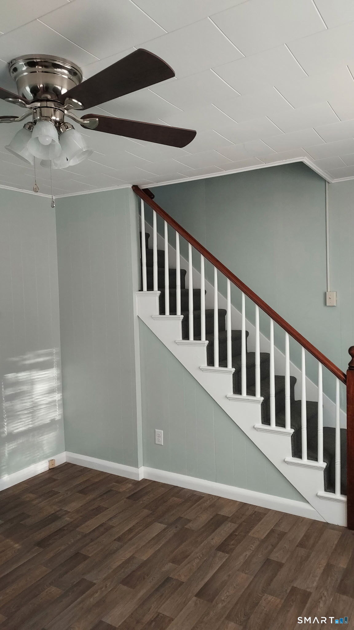 6 Boys Avenue Killingly, CT 06263 - Photo 5 of 20 a view of wooden floor and a window in a room