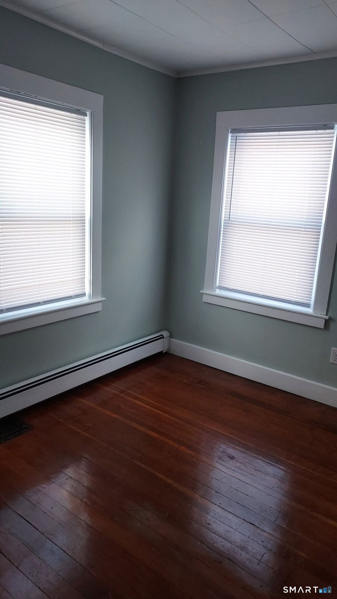 6 Boys Avenue Killingly, CT 06263 - Photo 5 of 7 an empty room with wooden floor and a window