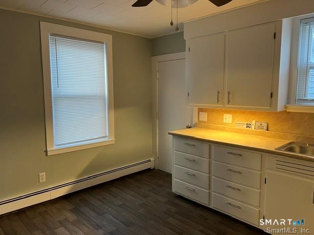 6 Boys Avenue Killingly, CT 06263 - Photo 10 of 20 a view of an empty room with wooden floor and a window