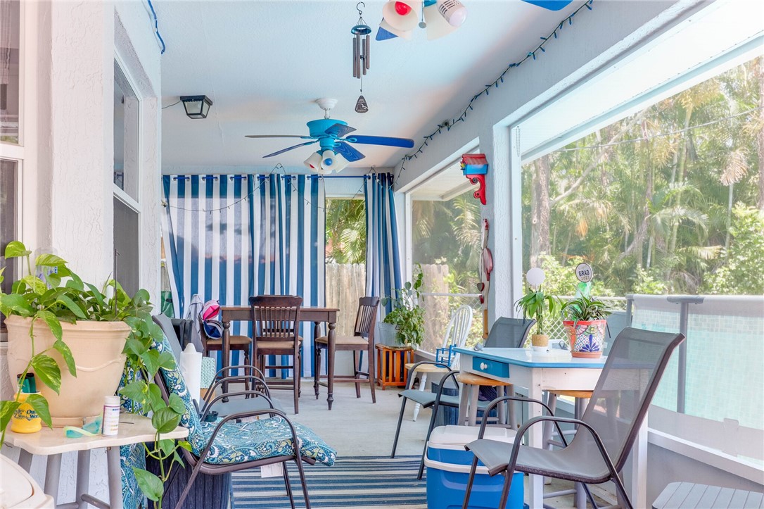 243 Main Street Sebastian, FL 32958 - Photo 10 of 11 a view of a dining room with furniture window and outside view
