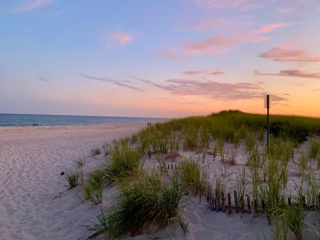 a view of lake with mountain in background
