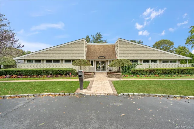 a view of house with outdoor space and street view