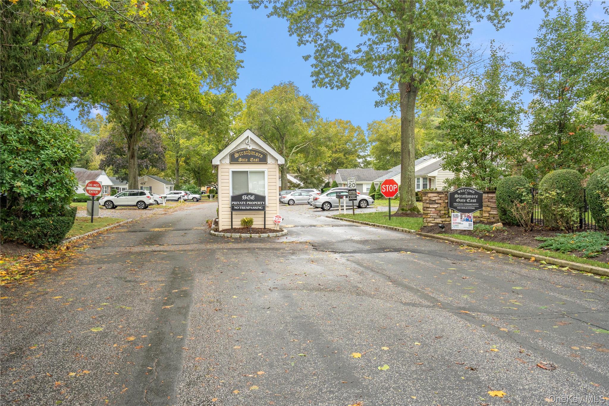 53 Freedom Lane Coram, NY 11784 - Photo 23 of 29 a view of a street with a parked cars