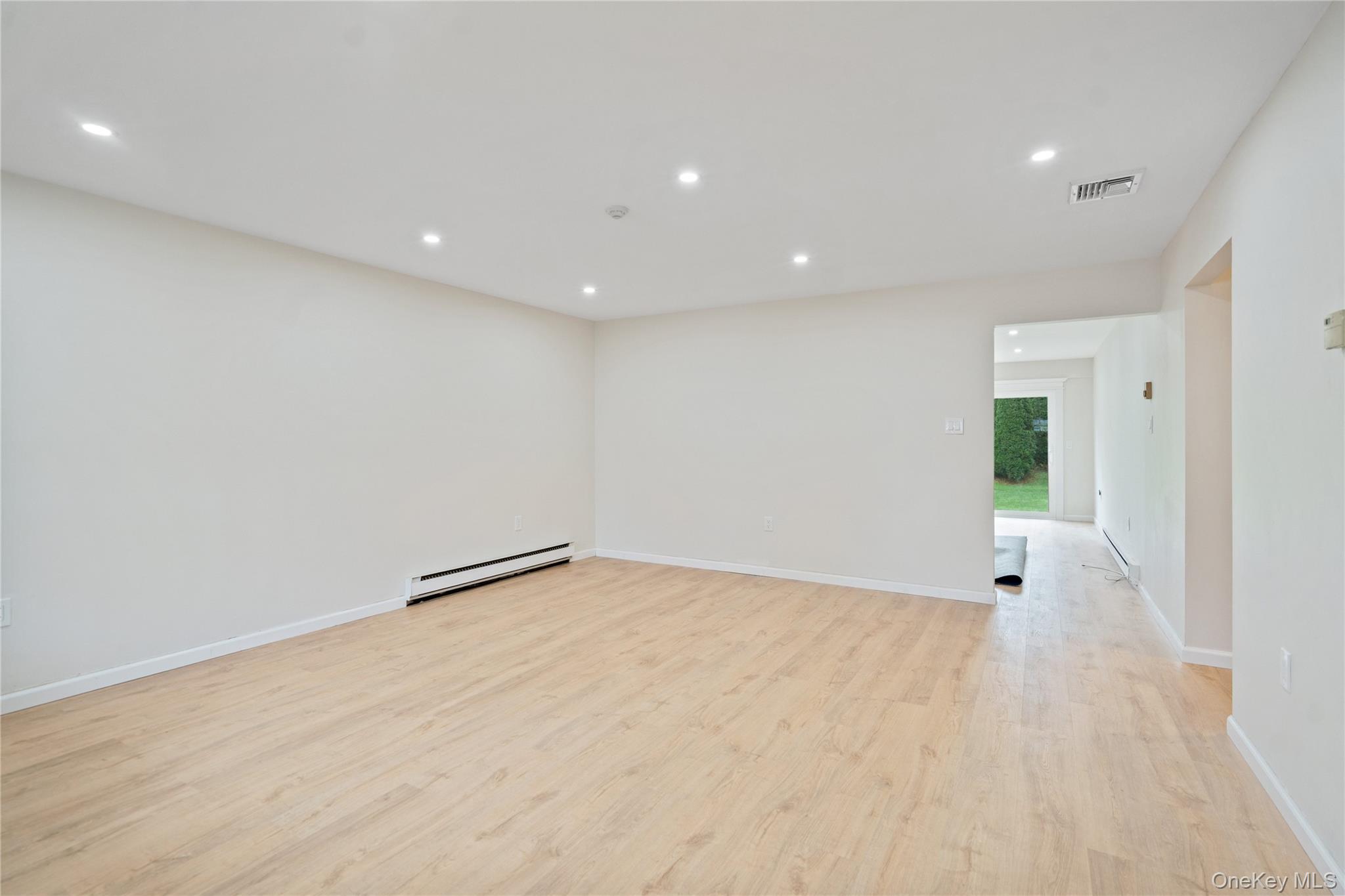 53 Freedom Lane Coram, NY 11784 - Photo 6 of 29 a view of an empty room