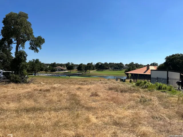 a view of swimming pool with a yard