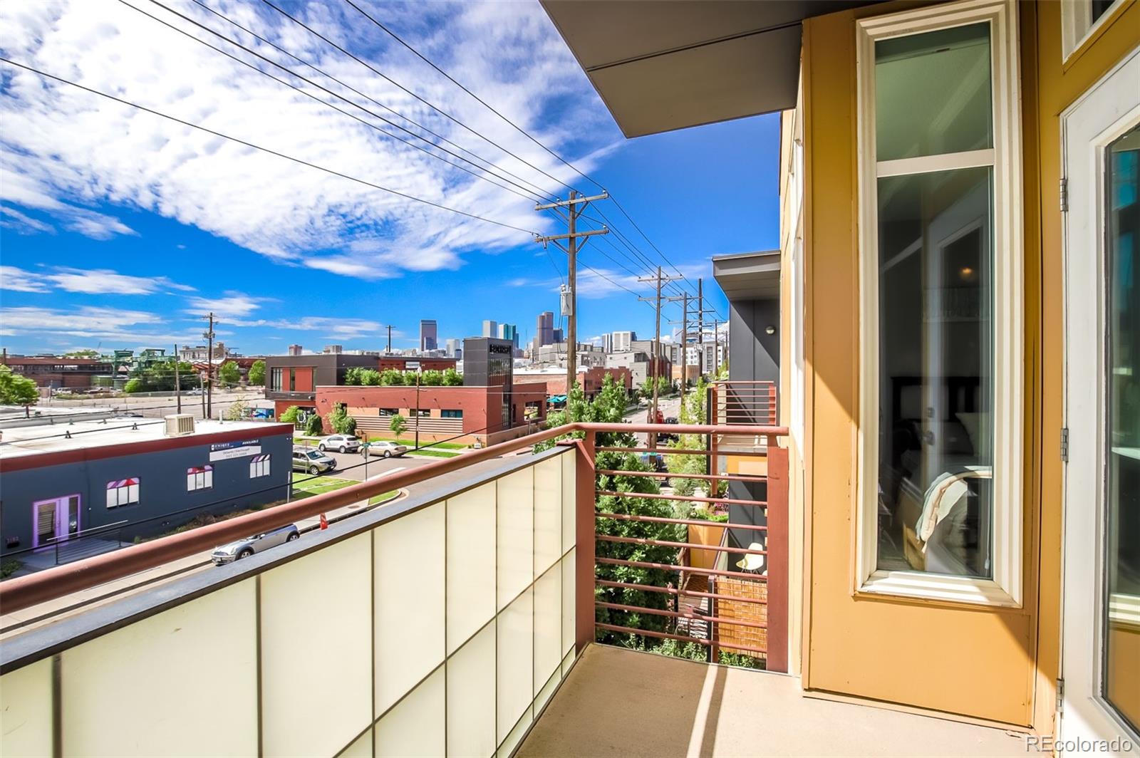 3101 Blake Street, Unit 305 Denver, CO 80205 - Photo 2 of 28 a city view from a balcony with city view