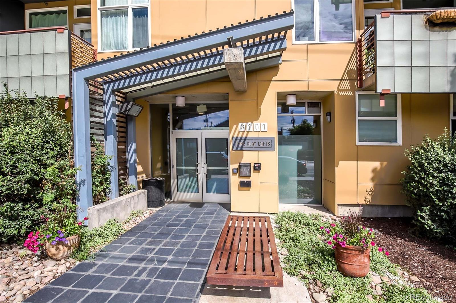 3101 Blake Street, Unit 305 Denver, CO 80205 - Photo 26 of 28 a front view of a building