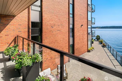 a view of balcony with furniture