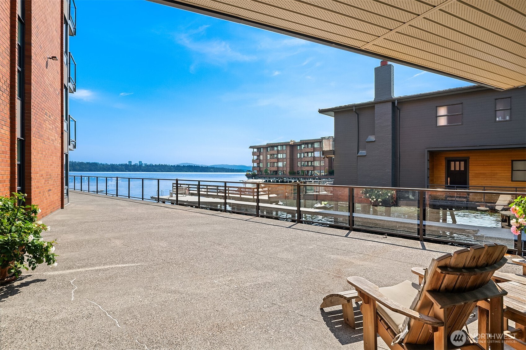2360 43rd Avenue East, Unit 211 Seattle, WA 98112 - Photo 24 of 26 a view of a terrace with chairs
