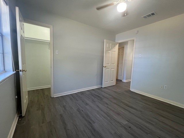 4721 9th Street, Unit A Bacliff, TX 77518 - Photo 12 of 27 an empty room with wooden floor and closet