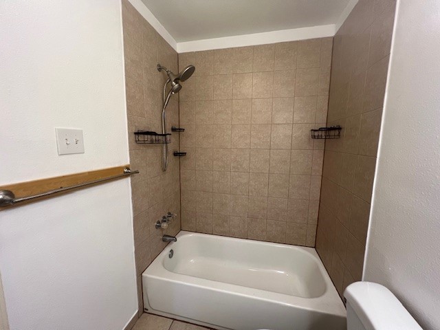 4721 9th Street, Unit A Bacliff, TX 77518 - Photo 14 of 27 a bathroom with a tub and a shower