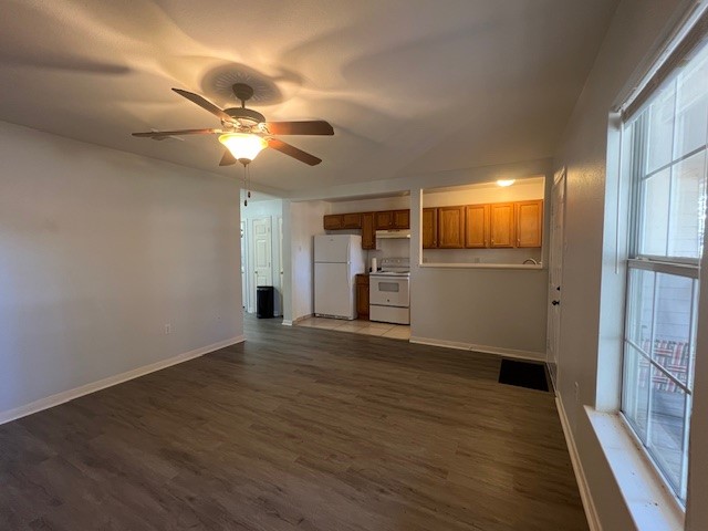 4721 9th Street, Unit A Bacliff, TX 77518 - Photo 5 of 27 a view of empty room with wooden floor and fan