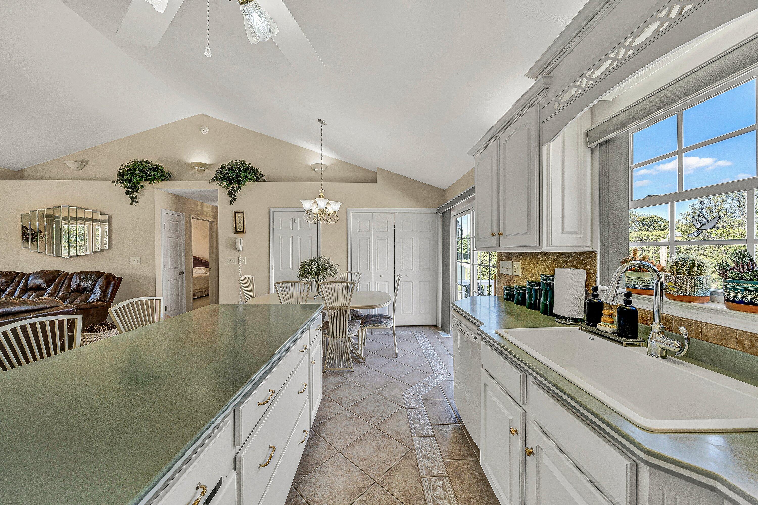1850 Emmaus Church Road Moneta, VA 24121 - Photo 12 of 63 a large kitchen with a large window and stainless steel appliances