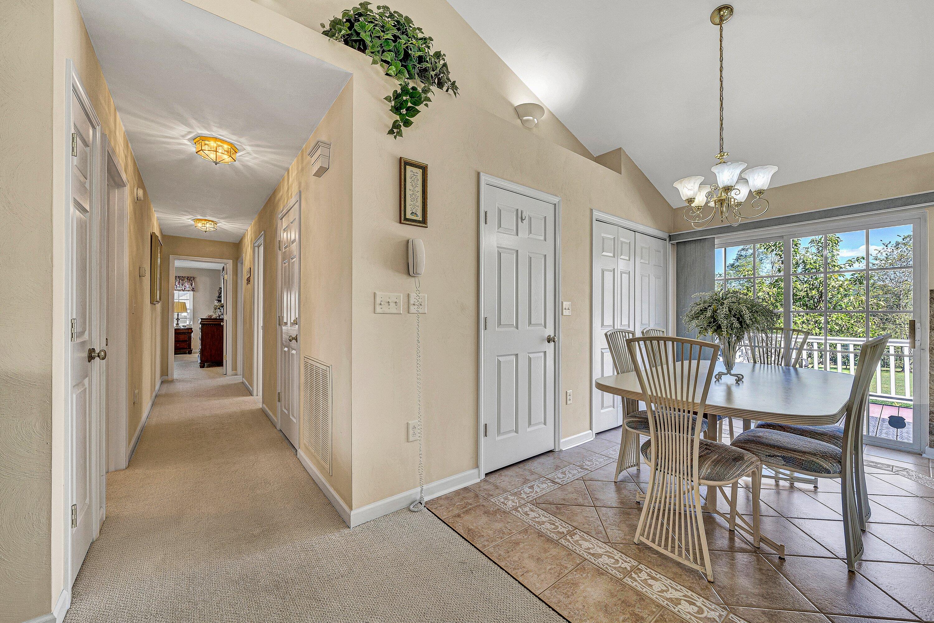 1850 Emmaus Church Road Moneta, VA 24121 - Photo 13 of 63 a view of a dining room with furniture window and wooden floor