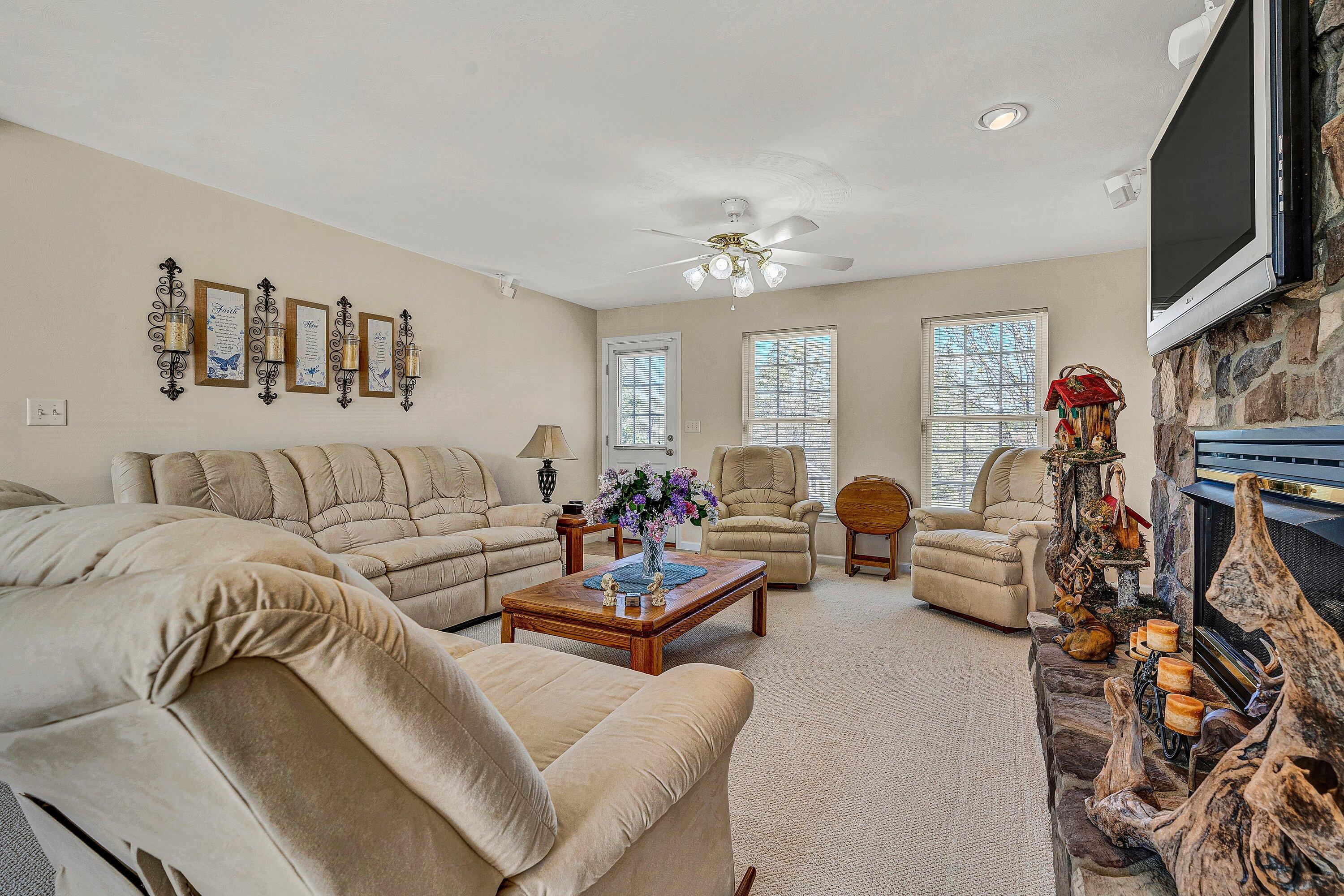 1850 Emmaus Church Road Moneta, VA 24121 - Photo 17 of 63 a living room with furniture or couch and a flat screen tv