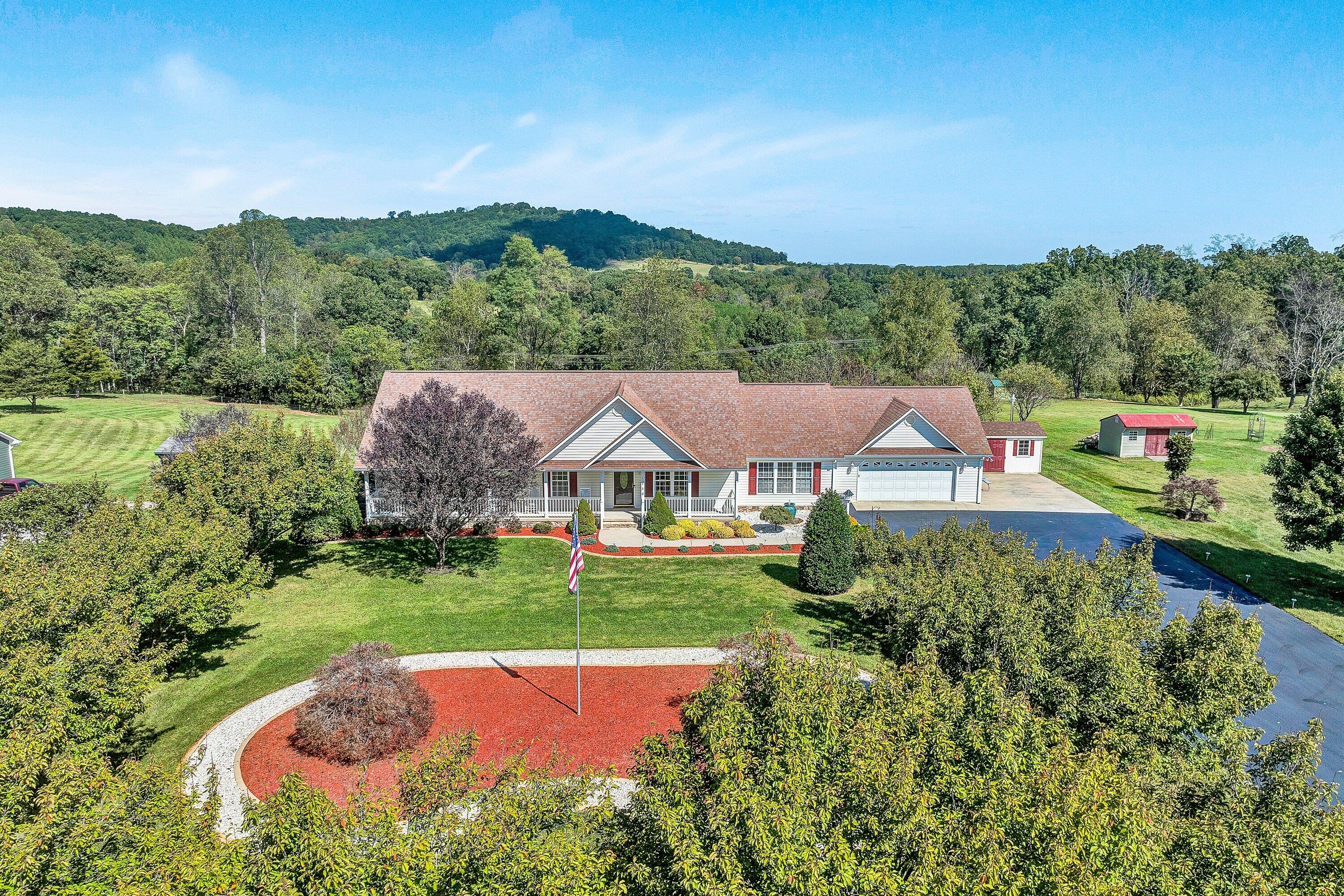 1850 Emmaus Church Road Moneta, VA 24121 - Photo 3 of 63 an aerial view of a house