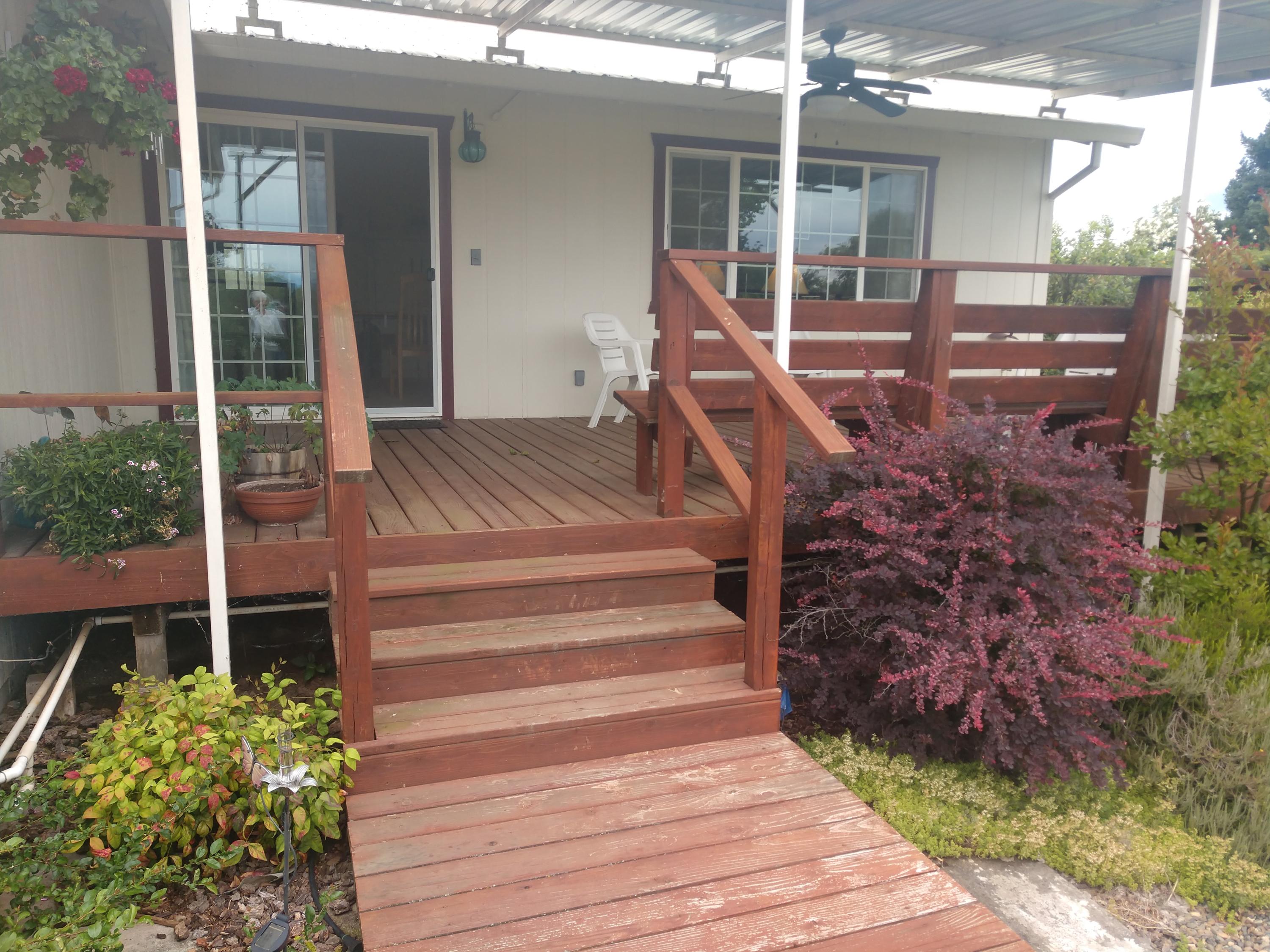 4667 Balls Ferry Road Anderson, CA 96007 - Photo 1 of 1 a front view of a house with garden